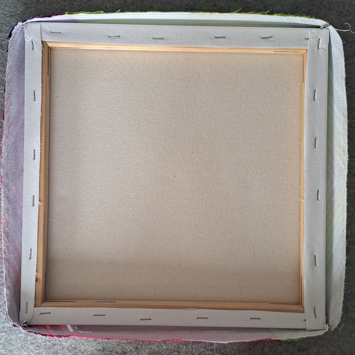 Scrappy FPP Hexagon mounted onto a canvas frame.